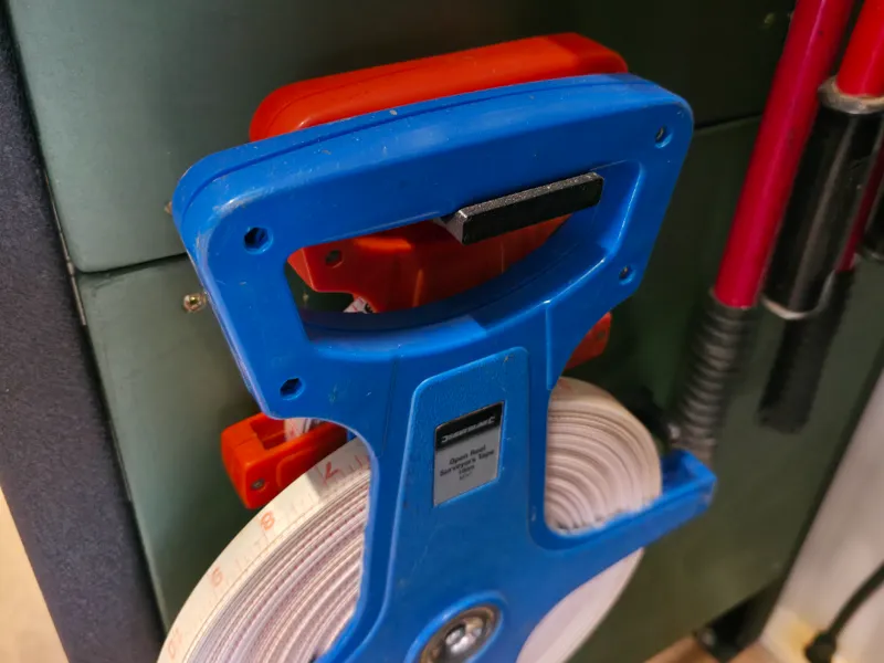 Large tape measure wall bracket