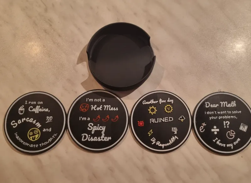 7.5cm Coasters x4, and holder