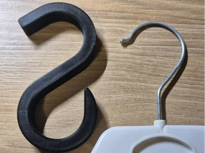 Universal hanger hook with standard spacing