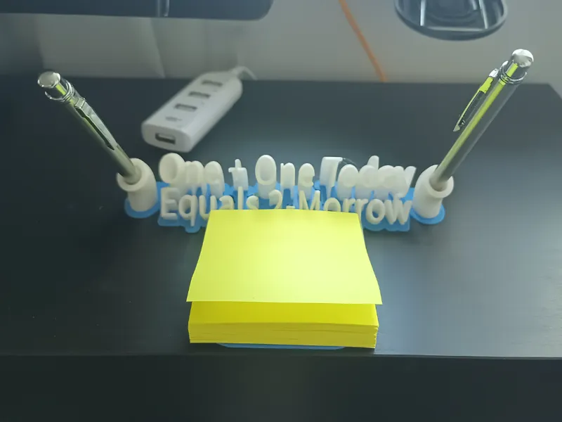 Motivational message pen holder for office