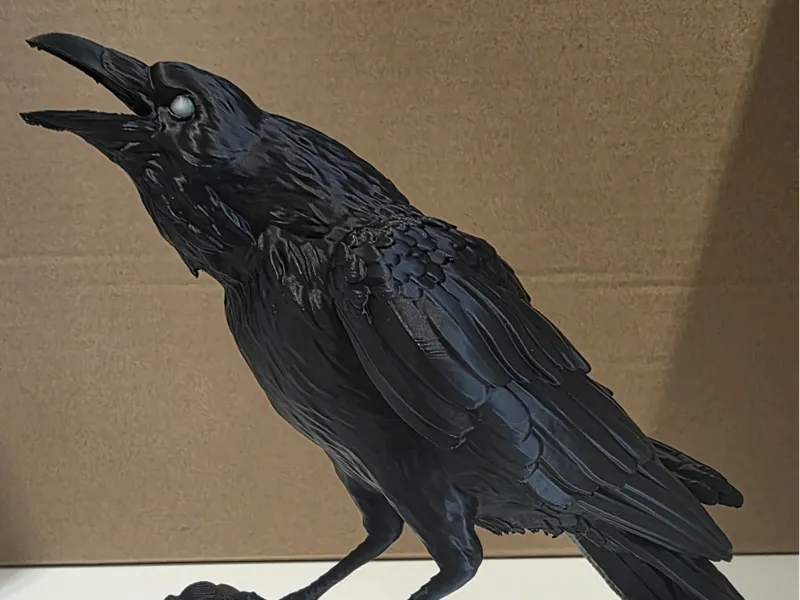 Realistic raven on a stick model