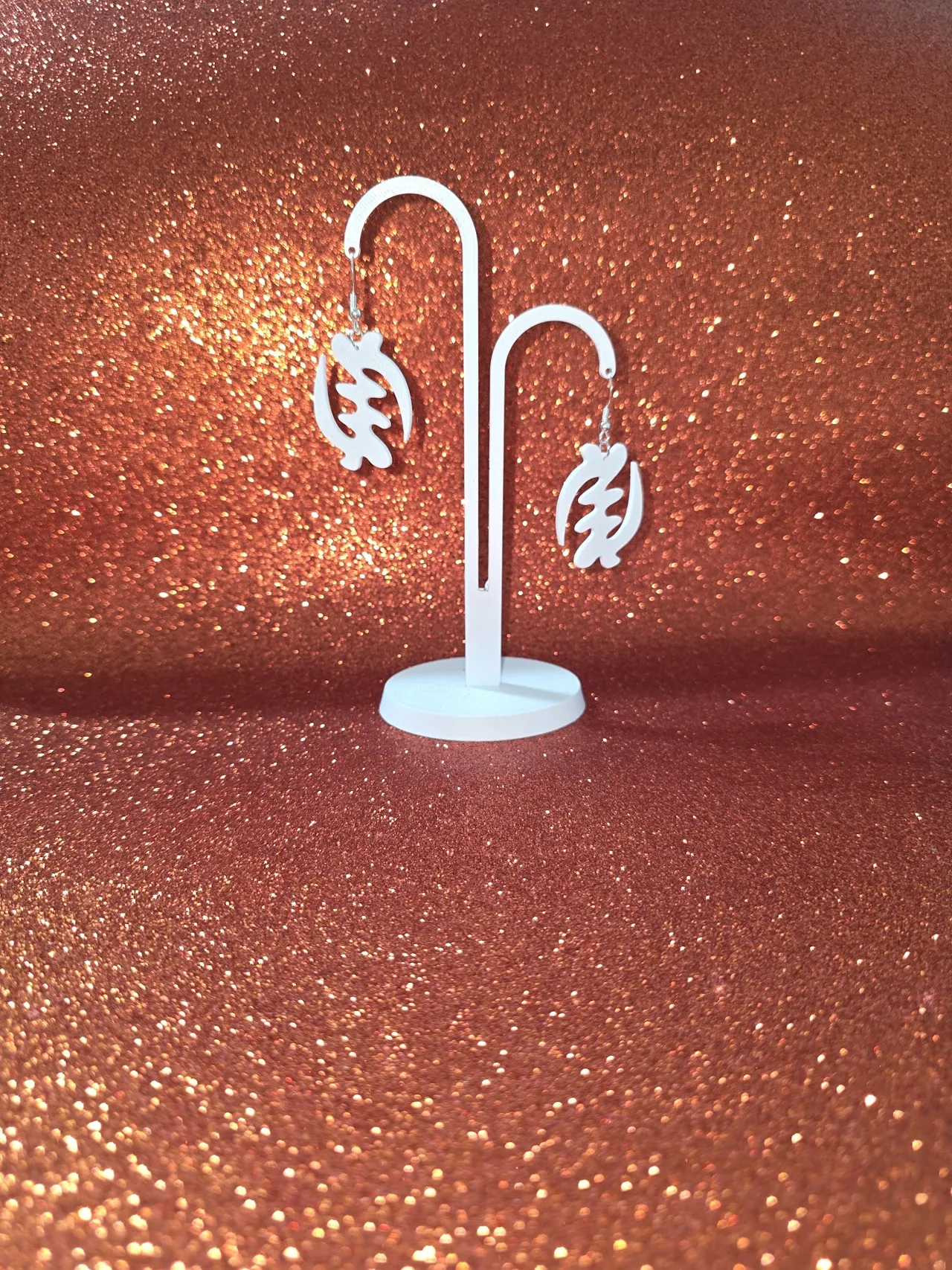 Supremacy of god earrings view 3