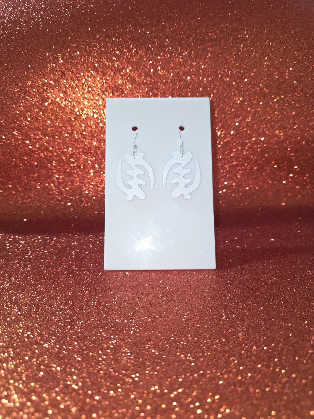 Supremacy of god earrings view 2