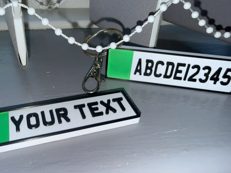 A keyring design replicating the UK number plates 