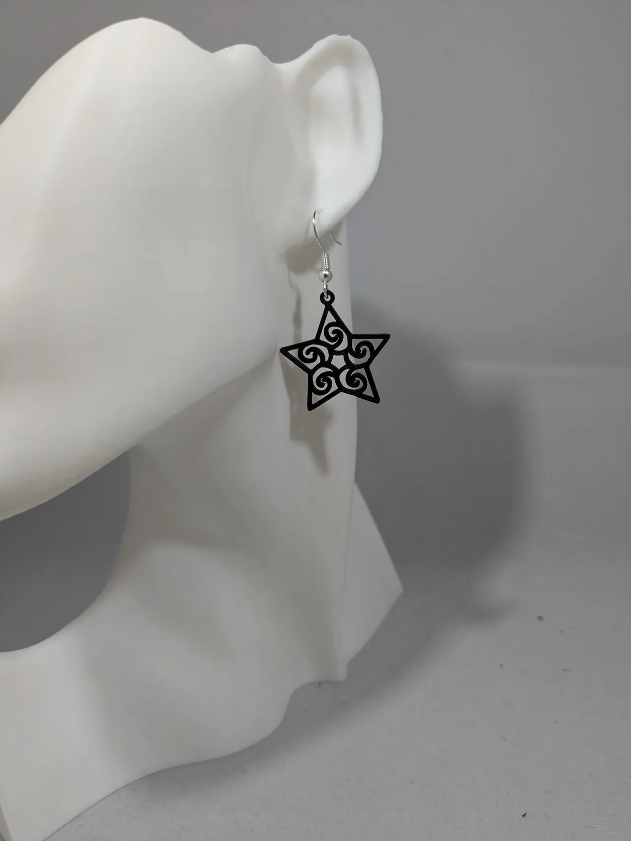Star with waves earrings view 3