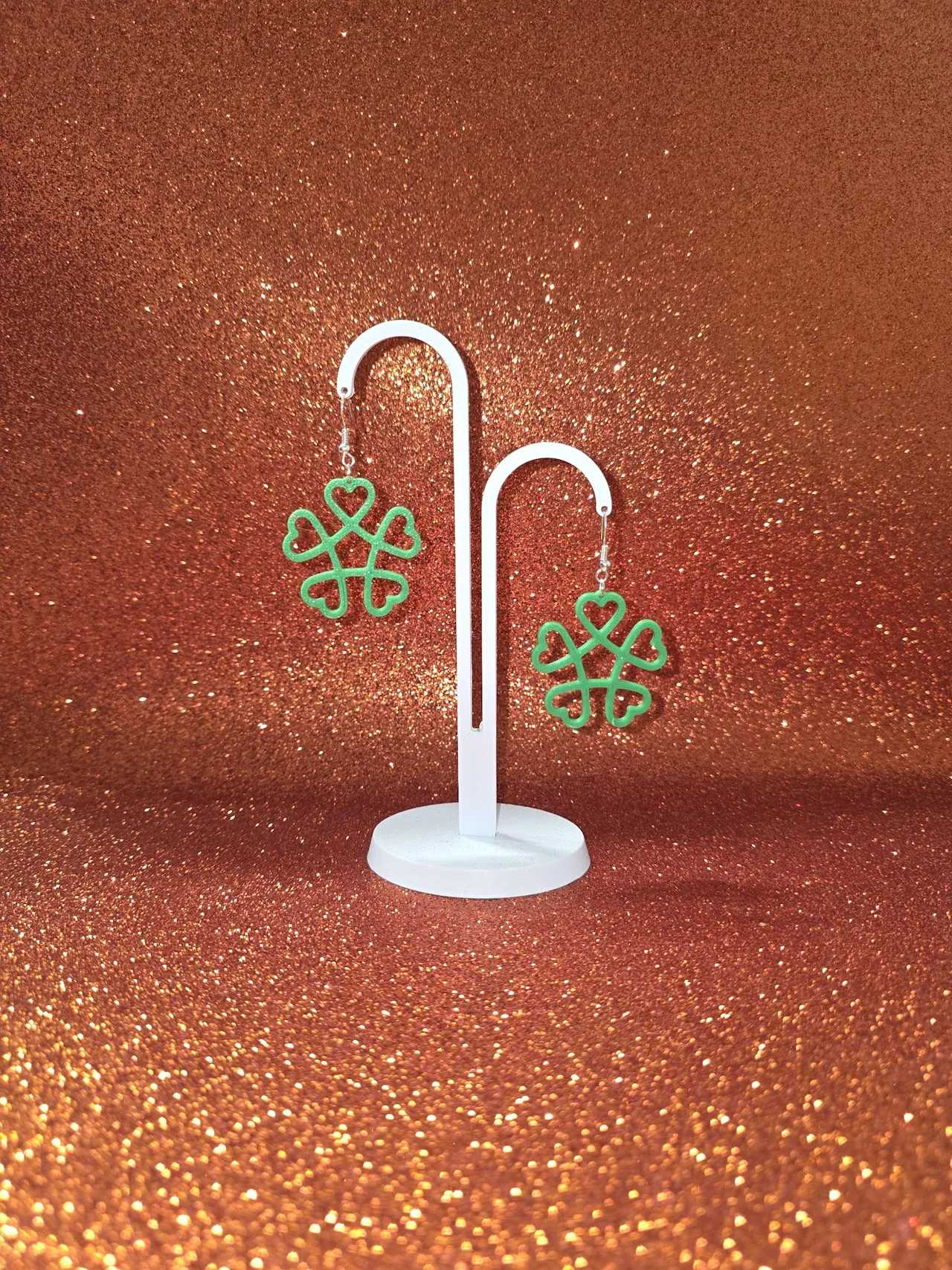 Stylized heart-shaped four-leaf clover earrings view 3