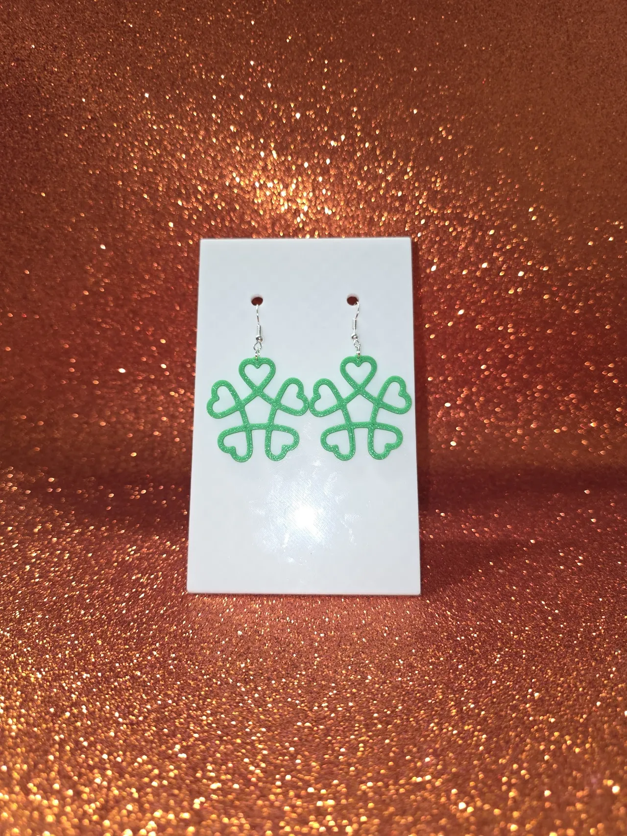 Stylized heart-shaped four-leaf clover earrings view 2