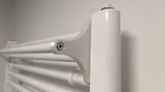 Towel holder for bathroom radiator