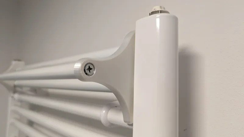 Towel holder for bathroom radiator