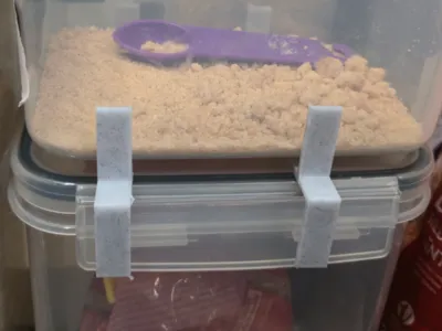 Tub stacker. Aligns tupperware type containers