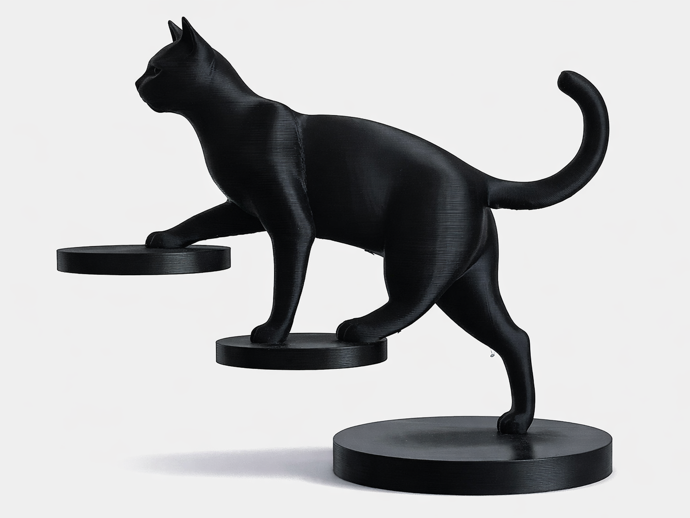 Balancing Cat Sculpture
