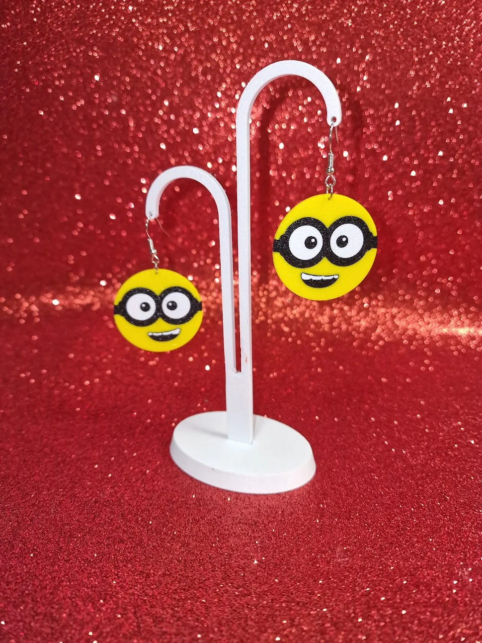 Minions face ball earrings view 3