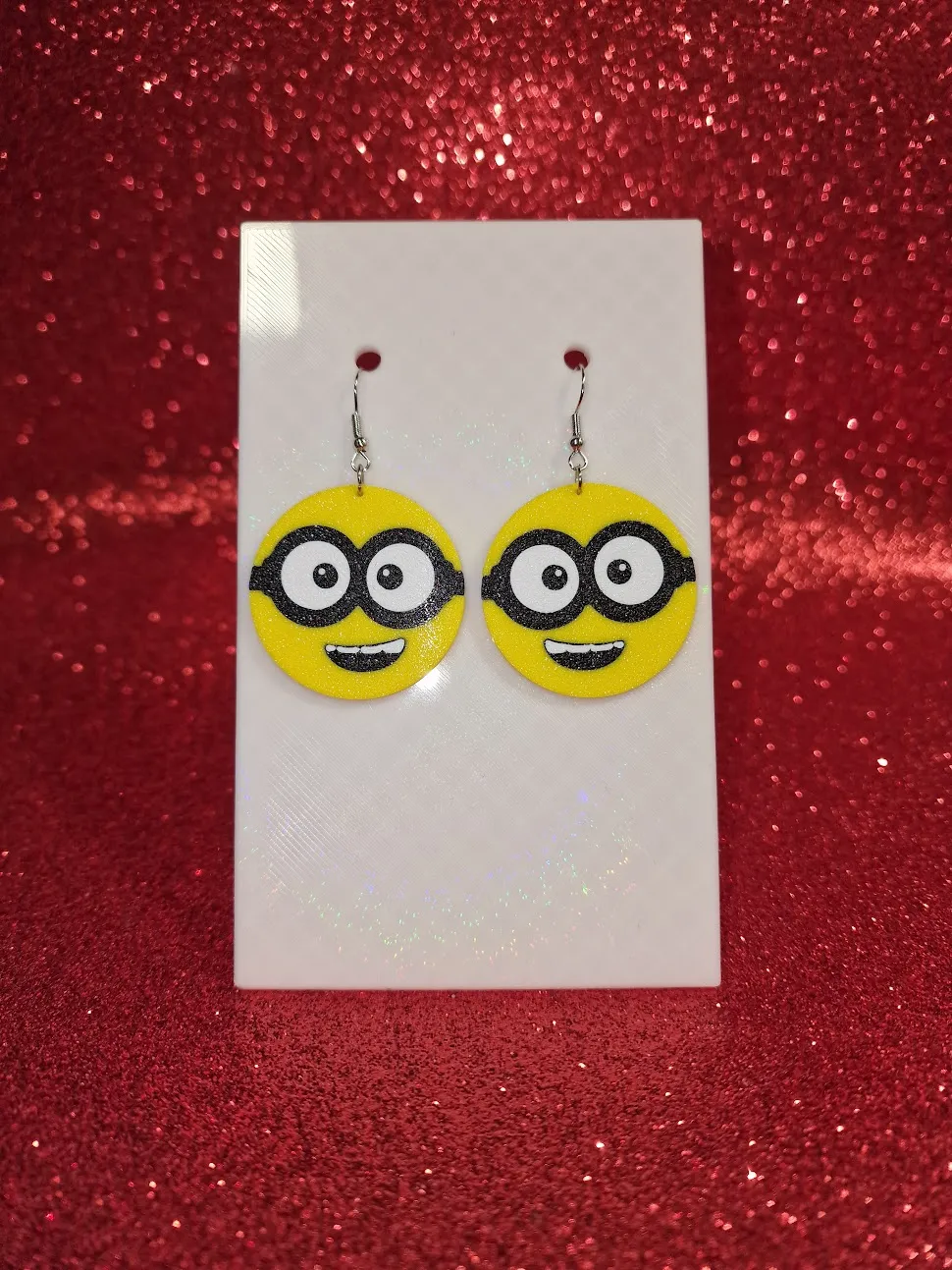 Minions face ball earrings view 2