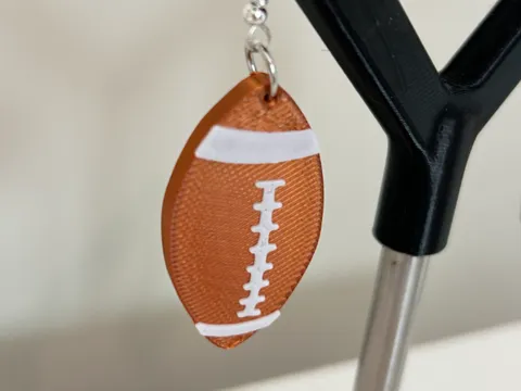 Rugby ball earrings