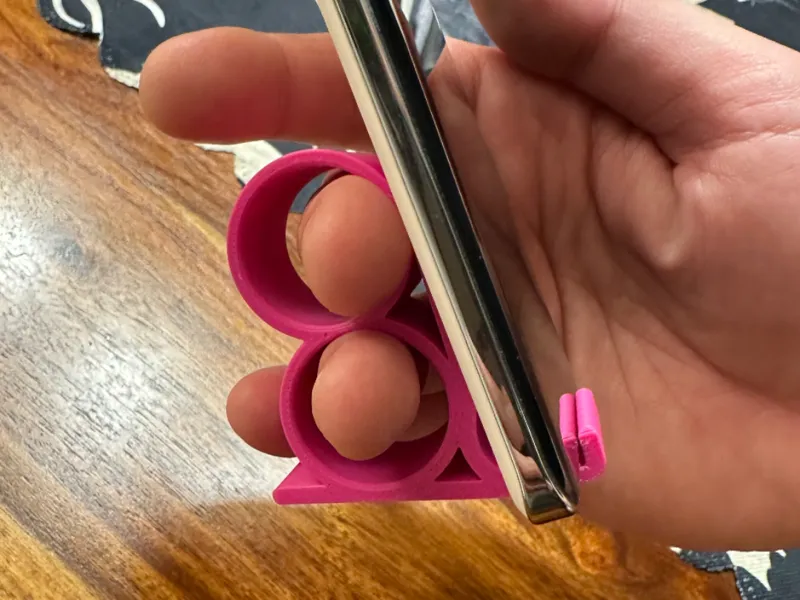 Phone holder for resting fingers