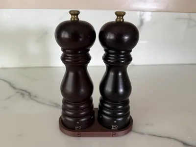 Minimalistic Peugeot pepper and salt mill stand
