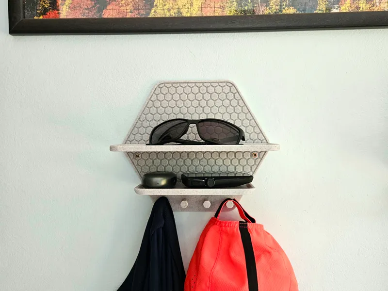 Modern wall shelf with hooks