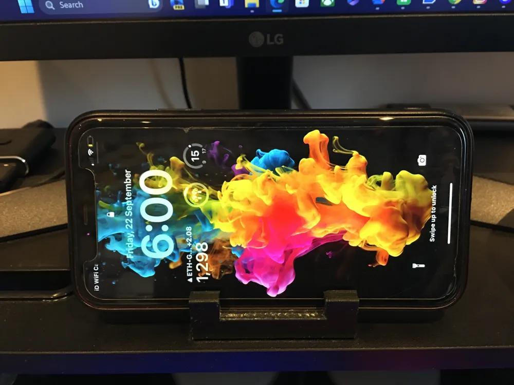 Phone Holder With Cut Out For iPhone Home Bar by PrinttX MakerWorld