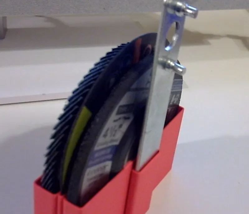 A very simple angle grinder attachment organizer 