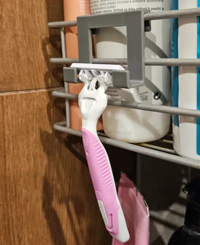 Shaver holder for shower shelf