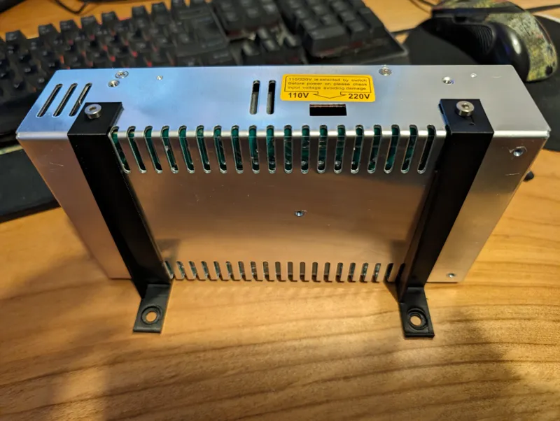 Quick release power supply bracket