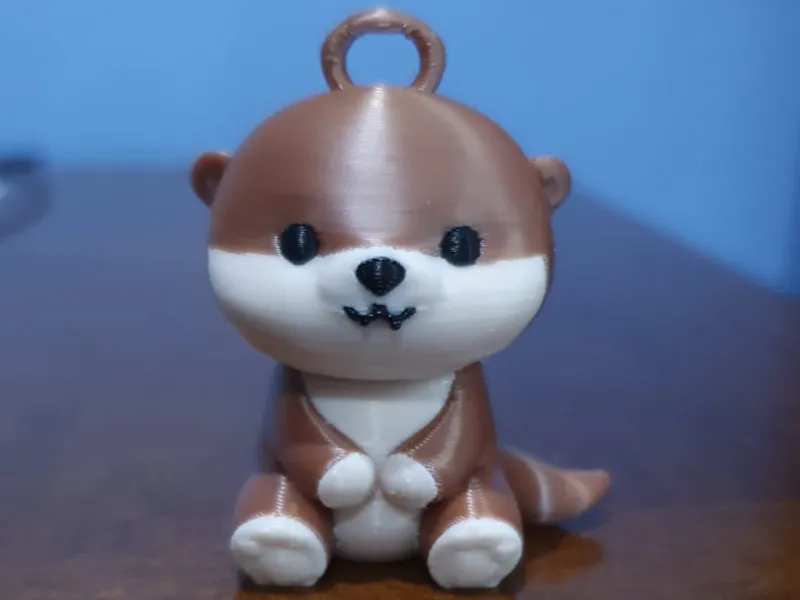 Lontra chaveiro chibi