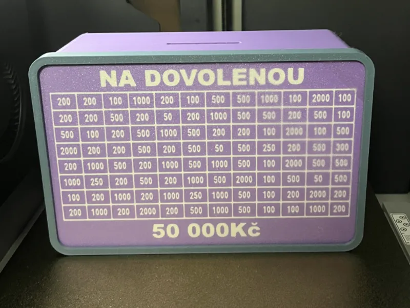 Rámeček na odškrtávací kasičku.