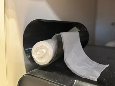 Trash bag holder with double sided tape mounting