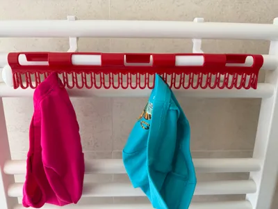 Towel bar hangers for small garments
