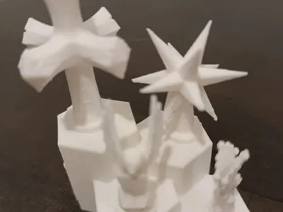 symbols that crown the Sagrada Familia