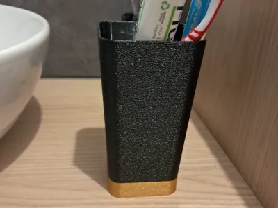 Draining toothbrush cup