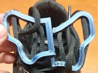 Butterfly shoelace buckle concept