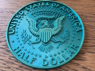Kennedy Half dollar coin 2 faces