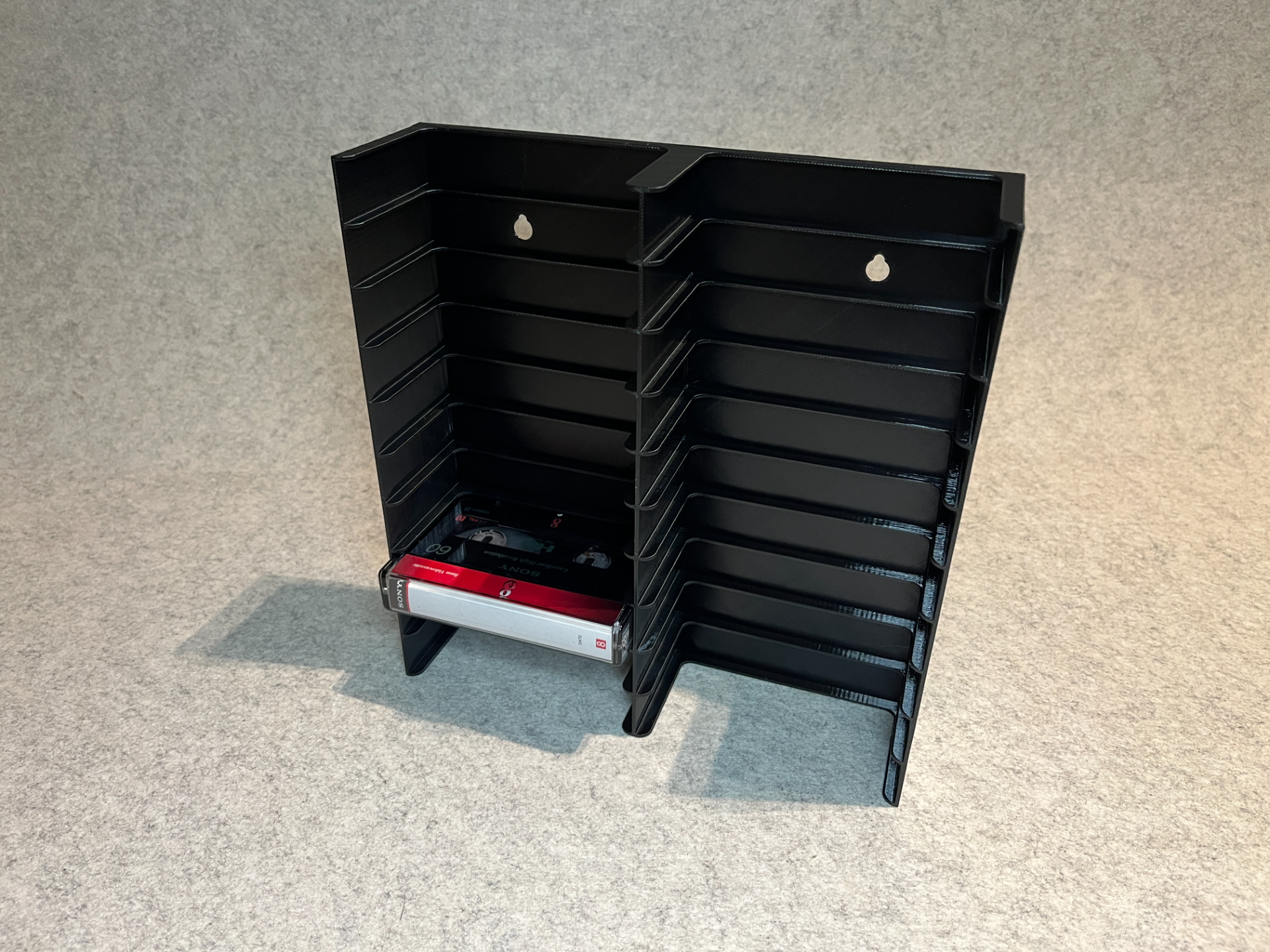 Wall stand holder for Video8 tapes