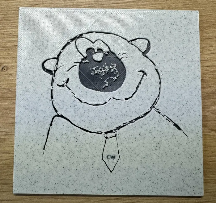 "Schnullerbär" in a relif