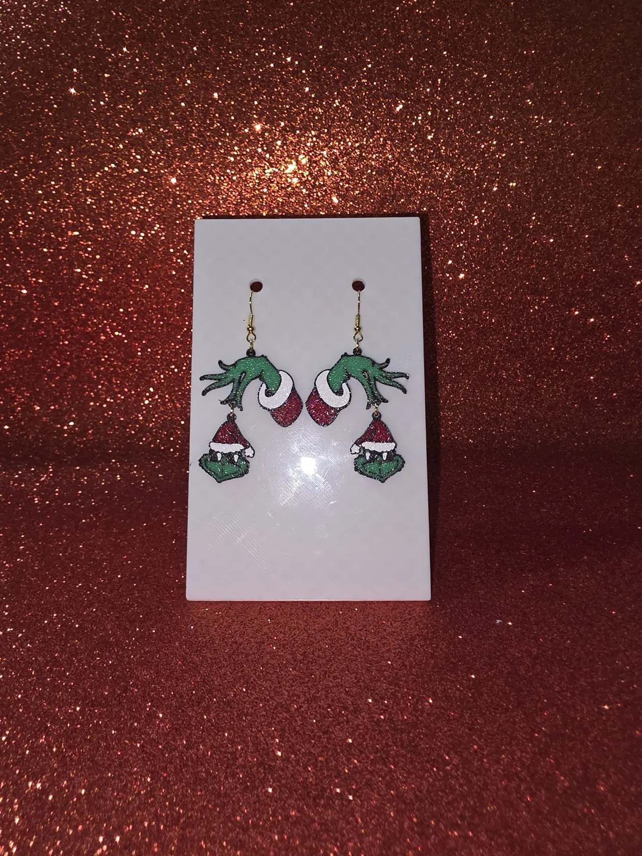 Hanging Grinch face v2 earrings view 2