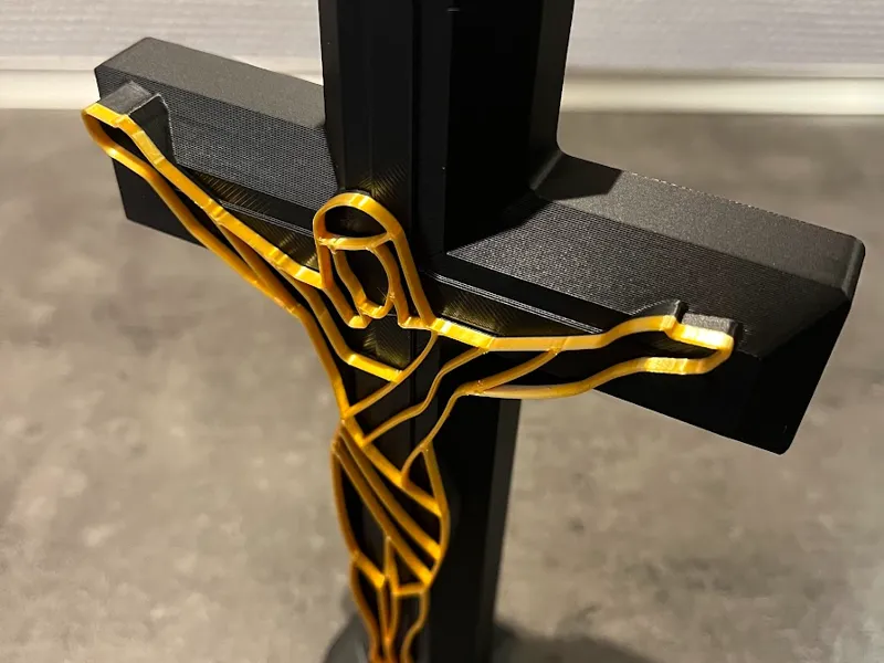 Golden Jesus on cross with stand