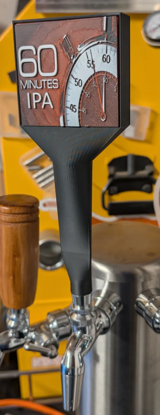 Beer tap handle with magnet sled face plates