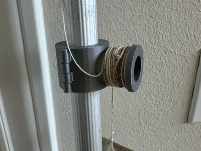 String Holder for Telescoping Pole