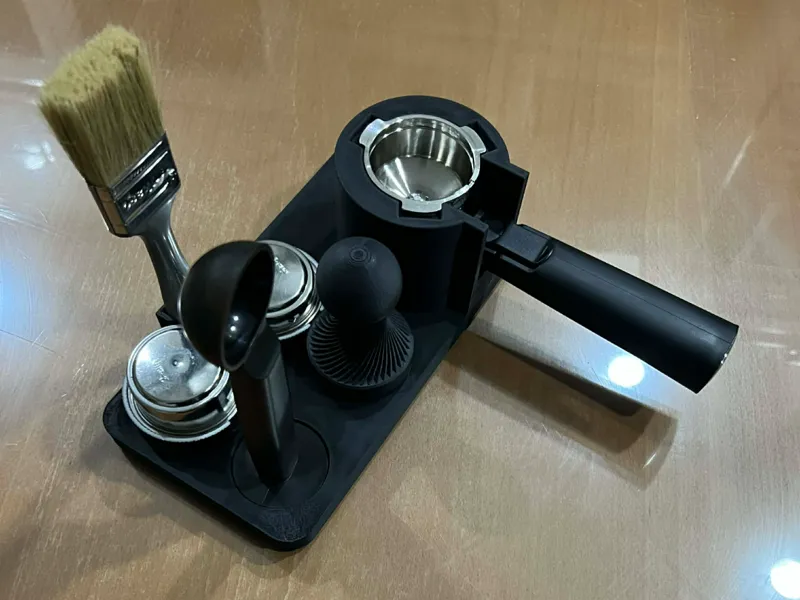Station pour accesoires de machine de café