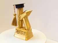 Kindergarten grad trophy plus cap