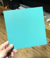 Cyan and Bambu Green blend to form 'Peacock Green'