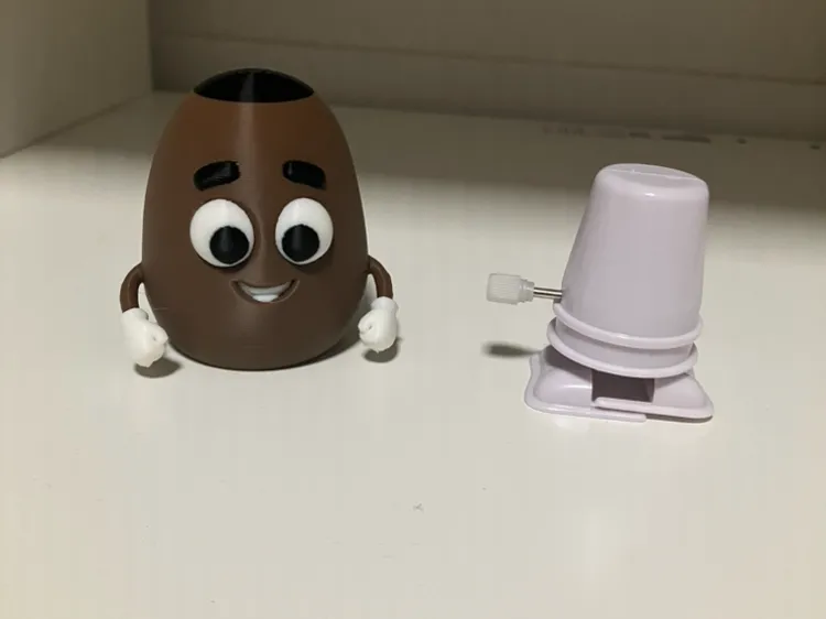 Wind Up Walking Mr Schoki Eggi