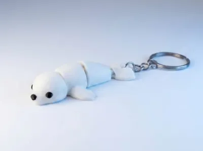 See Lion Keychain
