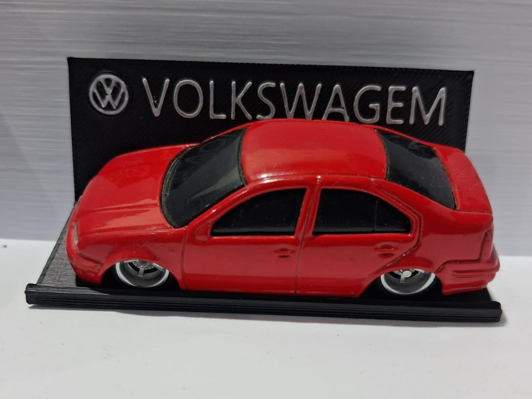 1-64 BASE INCLINAR MINIATURA NO EXPOSITOR COM AMS