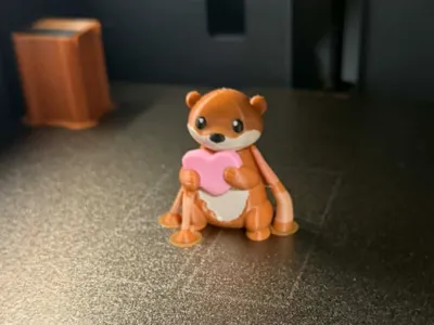 otter with heart