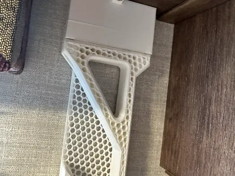 Spacer from Ratcheting Paper Towel Holder