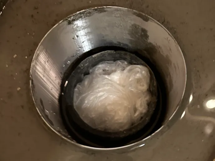 Concrete pour form for toilet flange