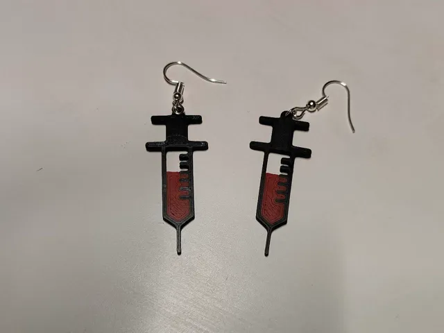 Pendientes jeringuillas