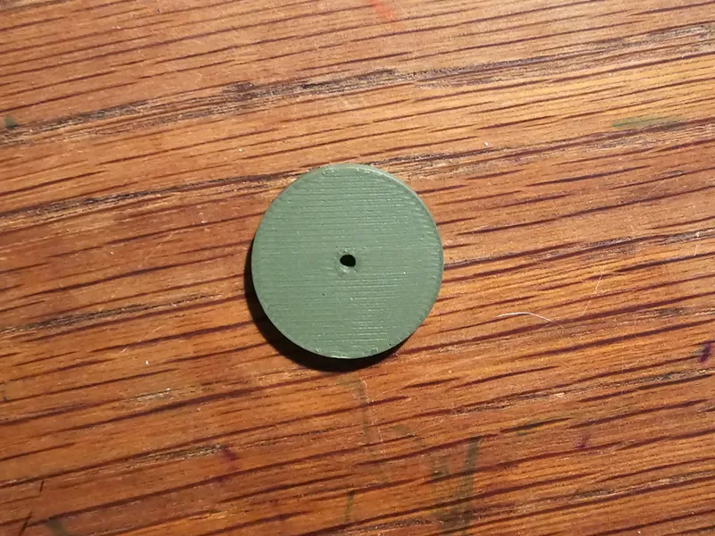 Soaker hose restrictor plate